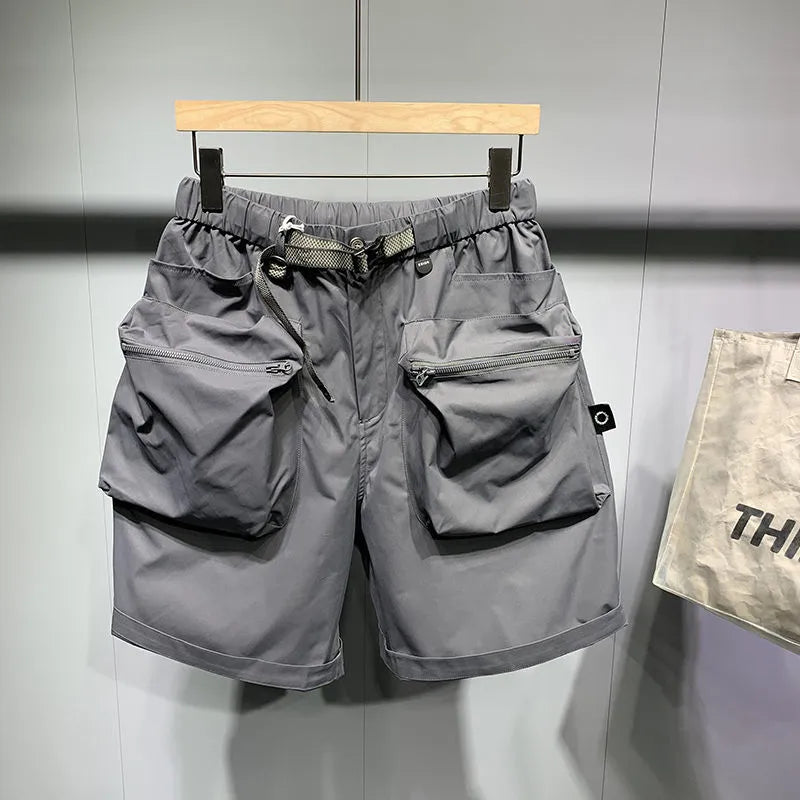 Men's large size work shorts in black with elastic waist and pockets
