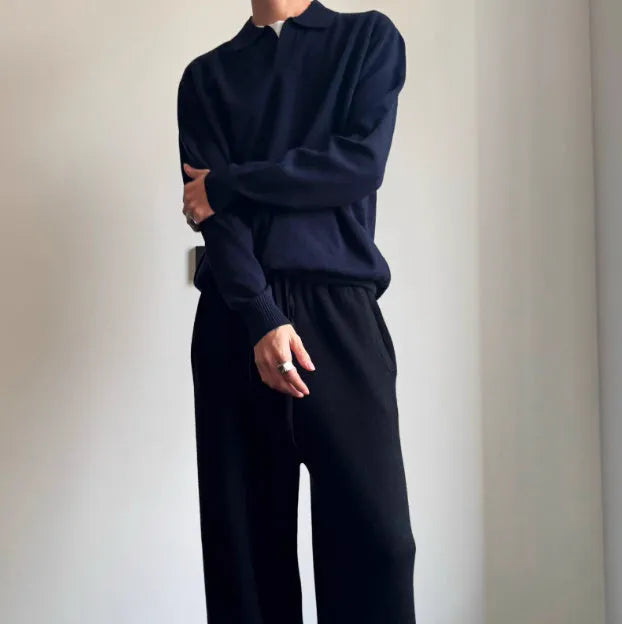 Pure wool polo sweater with lapel collar in loose fit, shown in navy blue colour.