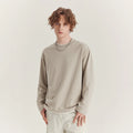 Men's loose fit long sleeved cotton blend t-shirt in solid colour on hanger