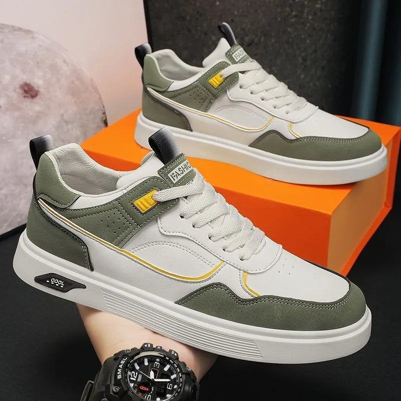 Men's solid colour canvas board shoes with leather stitching and a low-top design.