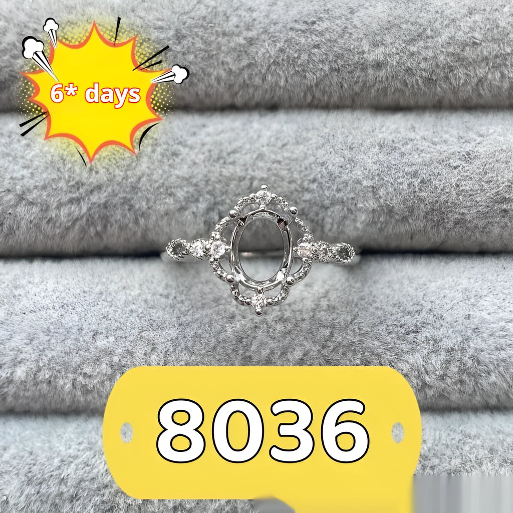 Oval denier ring with 6x8 mm stone and five-pointed star accent on open mouth copper band