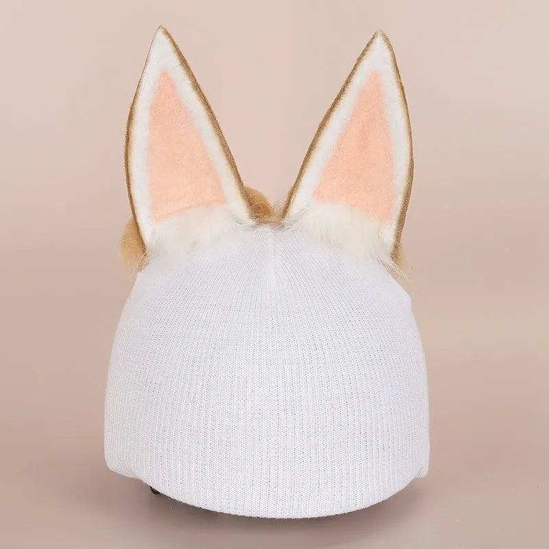 Soft plush cartoon character cover on a motorcycle helmet, showing size M and decorative ear sections.