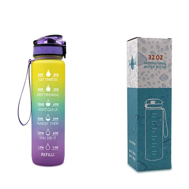 Blue and red gradient 1 litre Tritan sports water bottle with time markers and a black flip-top lid.