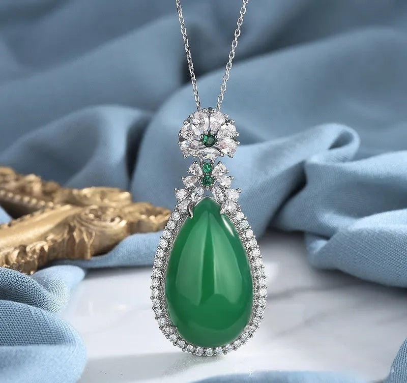 Green chalcedony water drop pendant with geometric ellipse shape and electroplated copper setting
