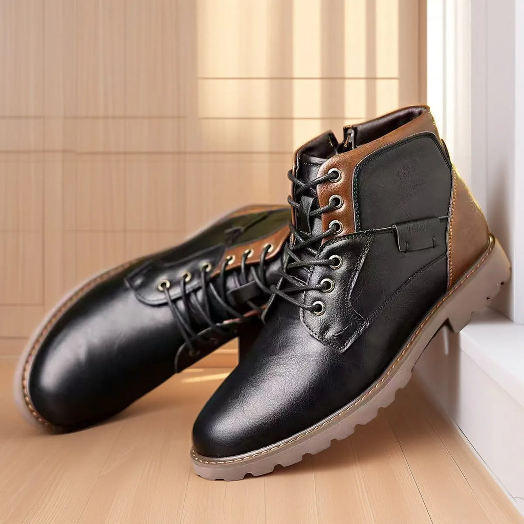 Men's brown leather-style ankle boot with a side zip and round toe on a rubber sole.