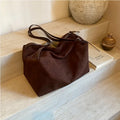 Women's large capacity fashion suede pillow shoulder bag in khaki, made of PU with slit pocket
