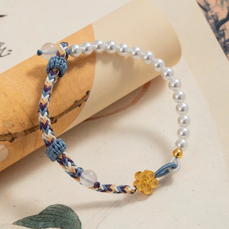 Peach coloured adjustable cord bracelet with Chinese flower weaving and sterling silver chalcedony accents