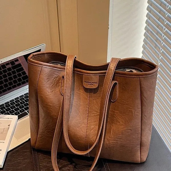 Women's large capacity PU shoulder bag in black with double straps and open top showing 37cm width and 29cm height