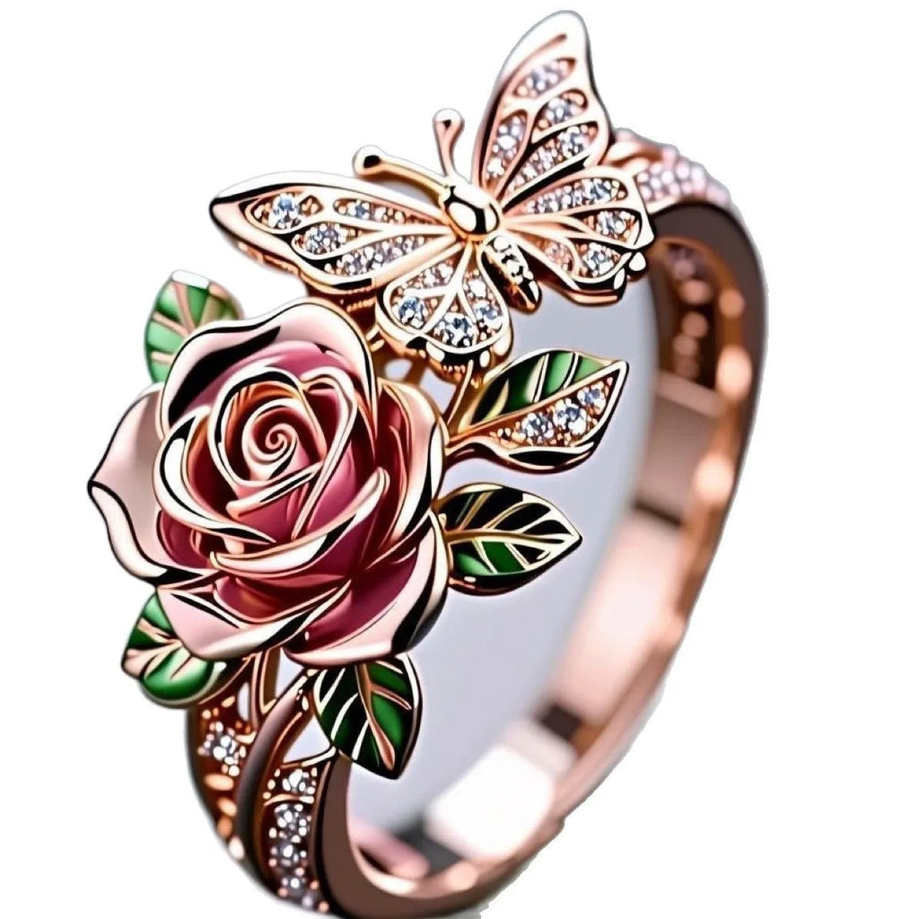 Colourful oil drip finish fairy style alloy ring with butterfly and floral motifs on an adjustable band.