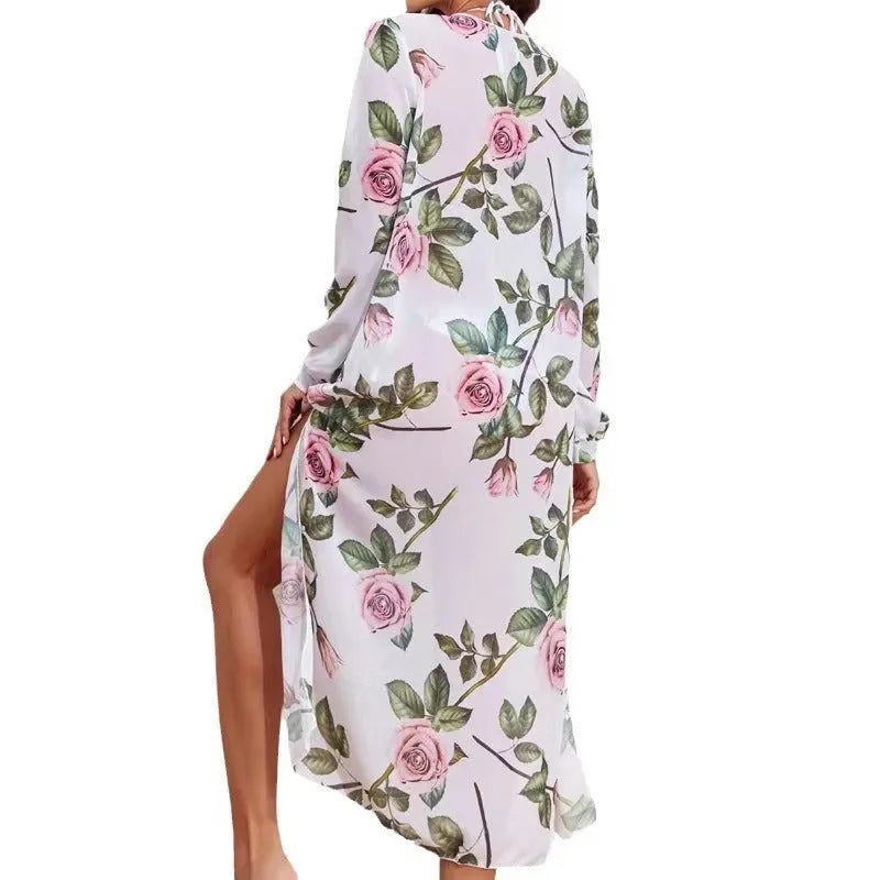 White printed three-piece women's swimsuit bikini set with bra, shorts, and long sleeve blouse.