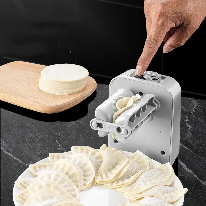 White electric automatic dumpling maker machine with USB charging cable and accessories