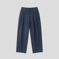Men's apricot wide-leg cotton linen trousers with a loose fit and pencil leg opening.