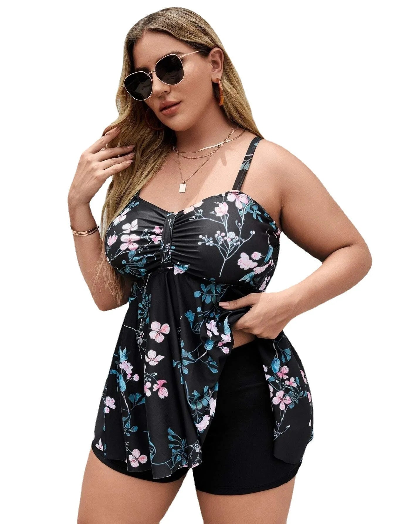Women's one-piece swimsuit with a split colour floral print pattern on high elasticity polyester fabric.