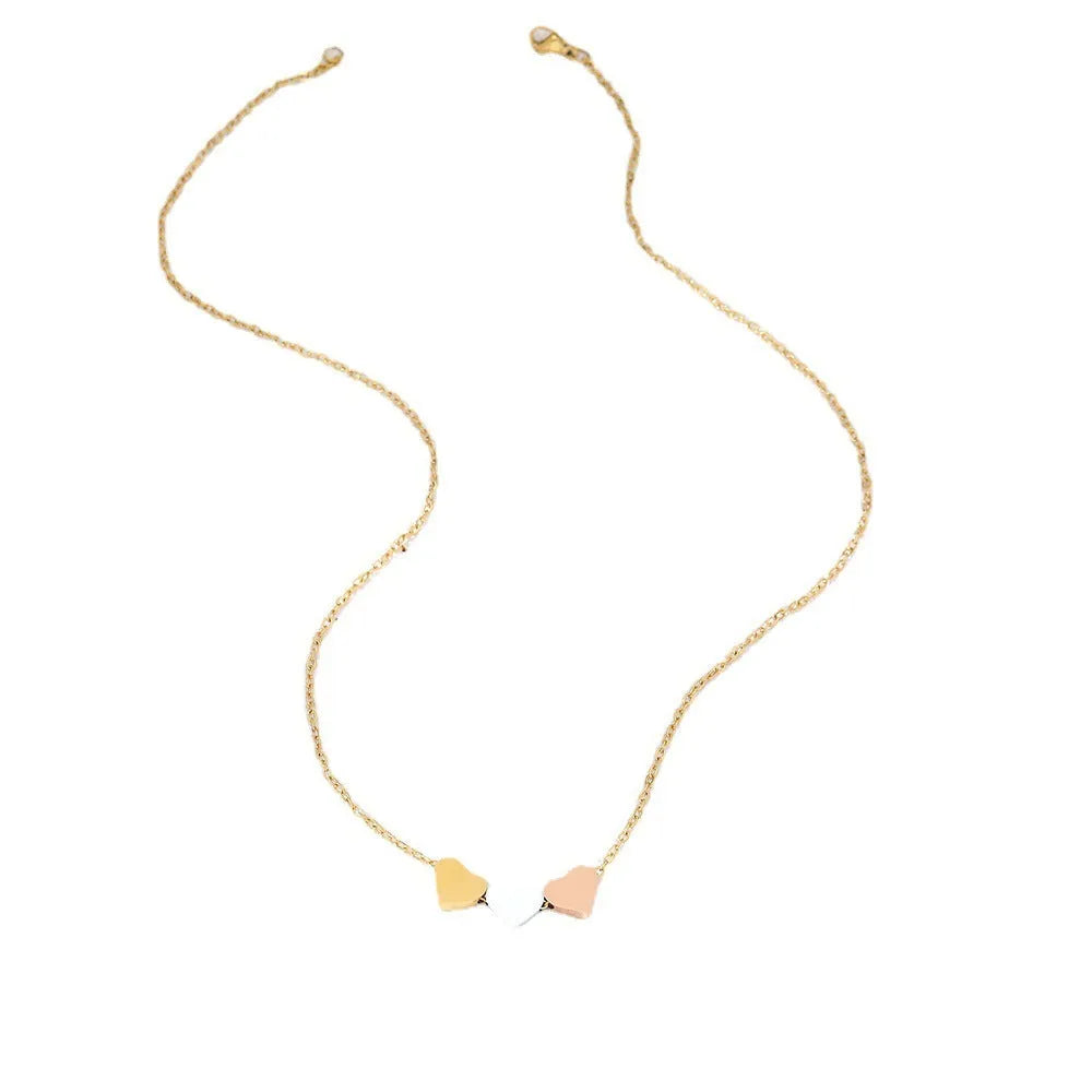 Mirror finish titanium steel heart pendant necklace in gold, rose gold, and steel colour options