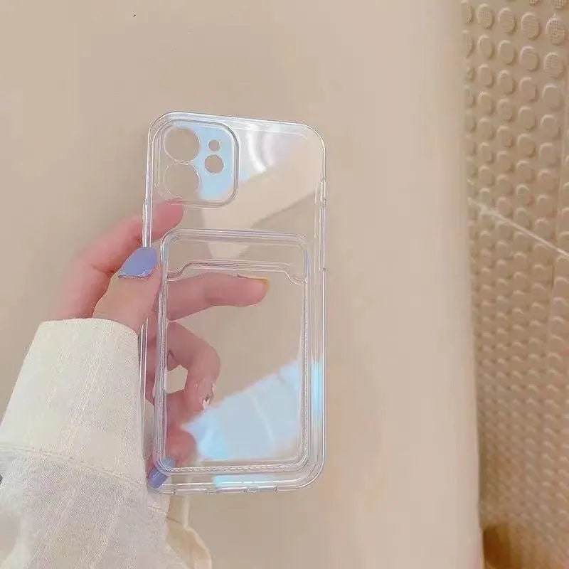 Transparent phone case with card slot for Apple iPhone on a table.