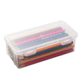 Clear plastic pencil storage box filled with colouring pencils and wax crayons.