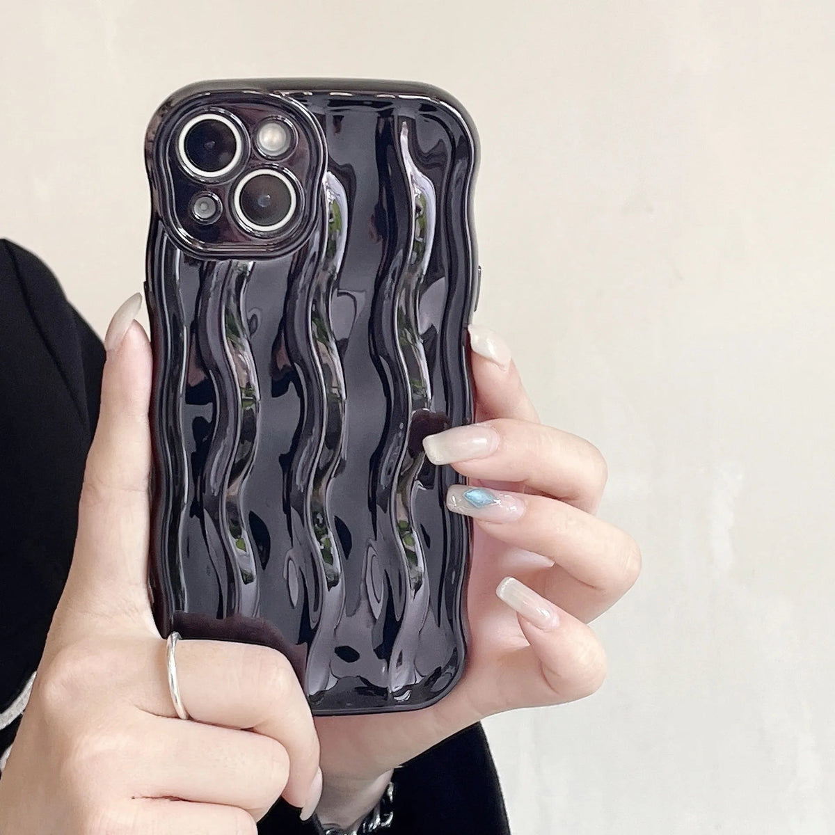 Electroplated water ripple iPhone case in silver with anti-fall TPU construction for iPhone 11-14 models.