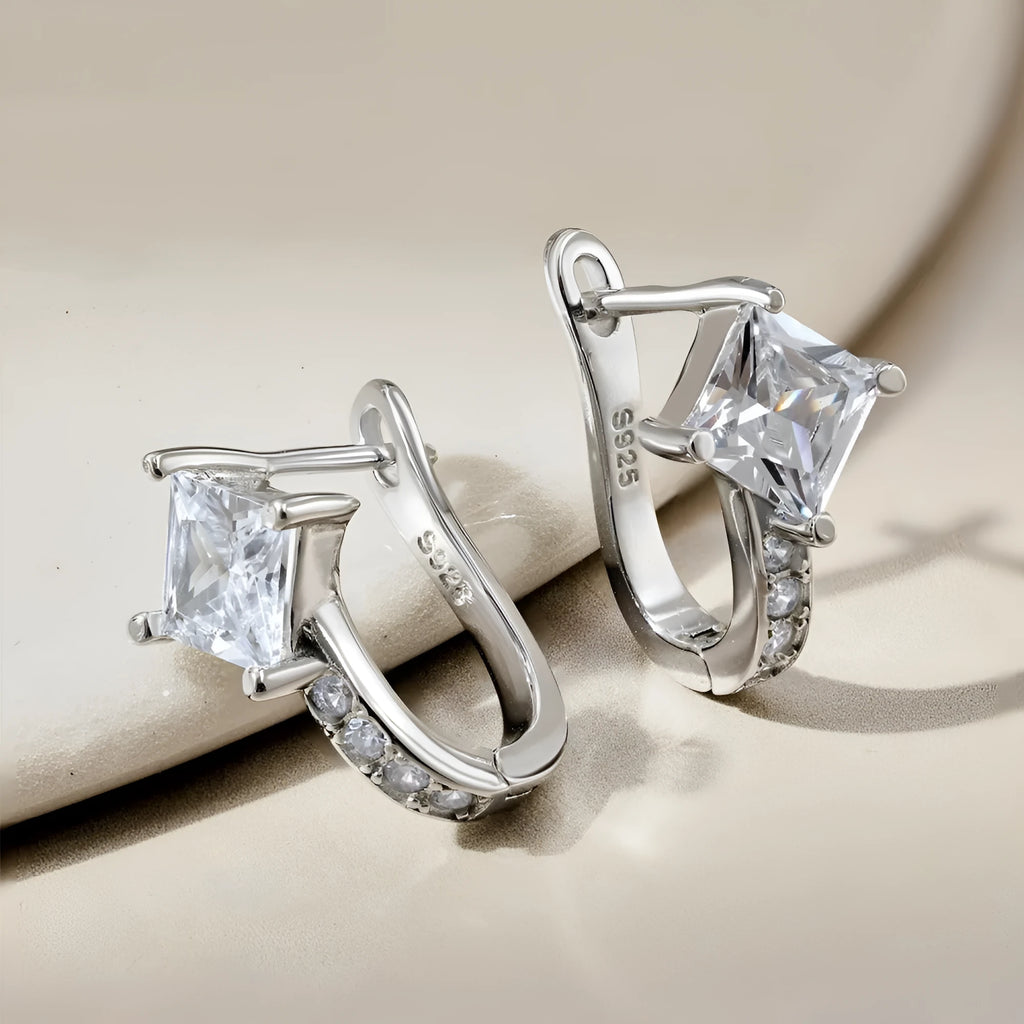 Pair of U-shaped zircon stud earrings in platinum white diamond colour on 925 silver, 10x14.5x17.5mm