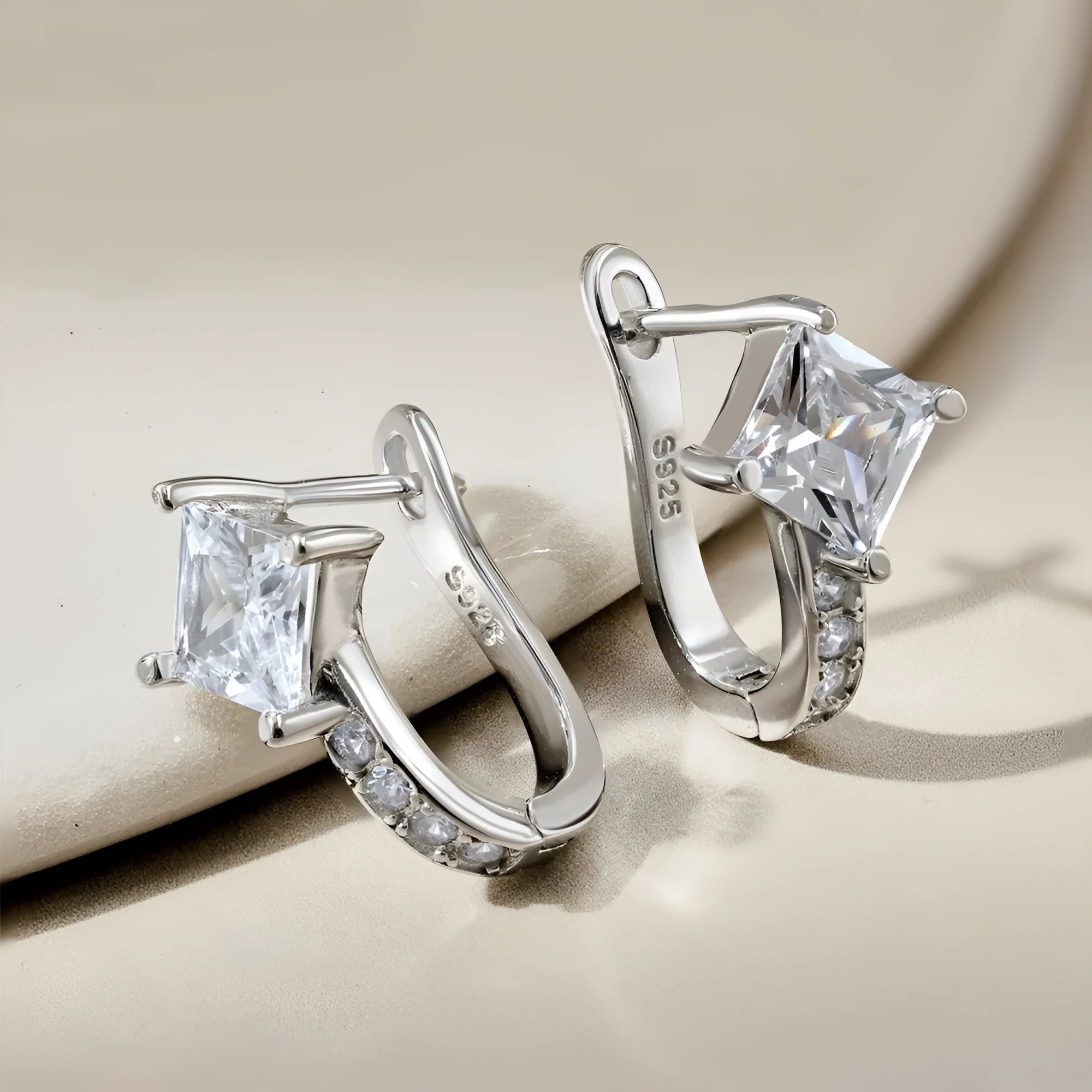 Pair of U-shaped zircon stud earrings in platinum white diamond colour on 925 silver, 10x14.5x17.5mm