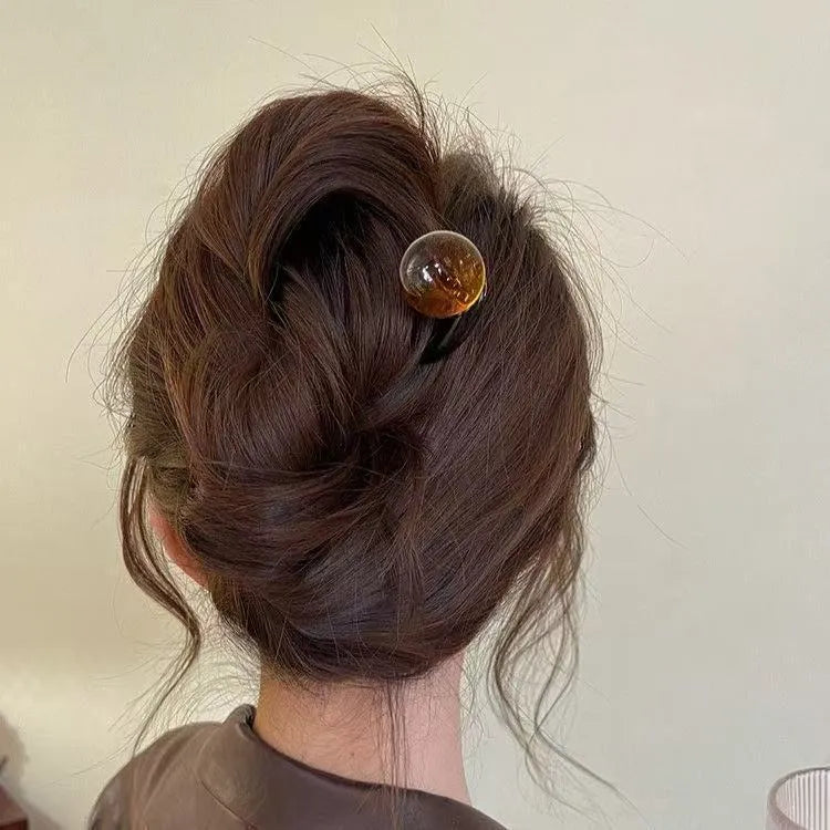 U-shaped hair barrettes with ball decoration in beige, caramel, dark gray and green colour options
