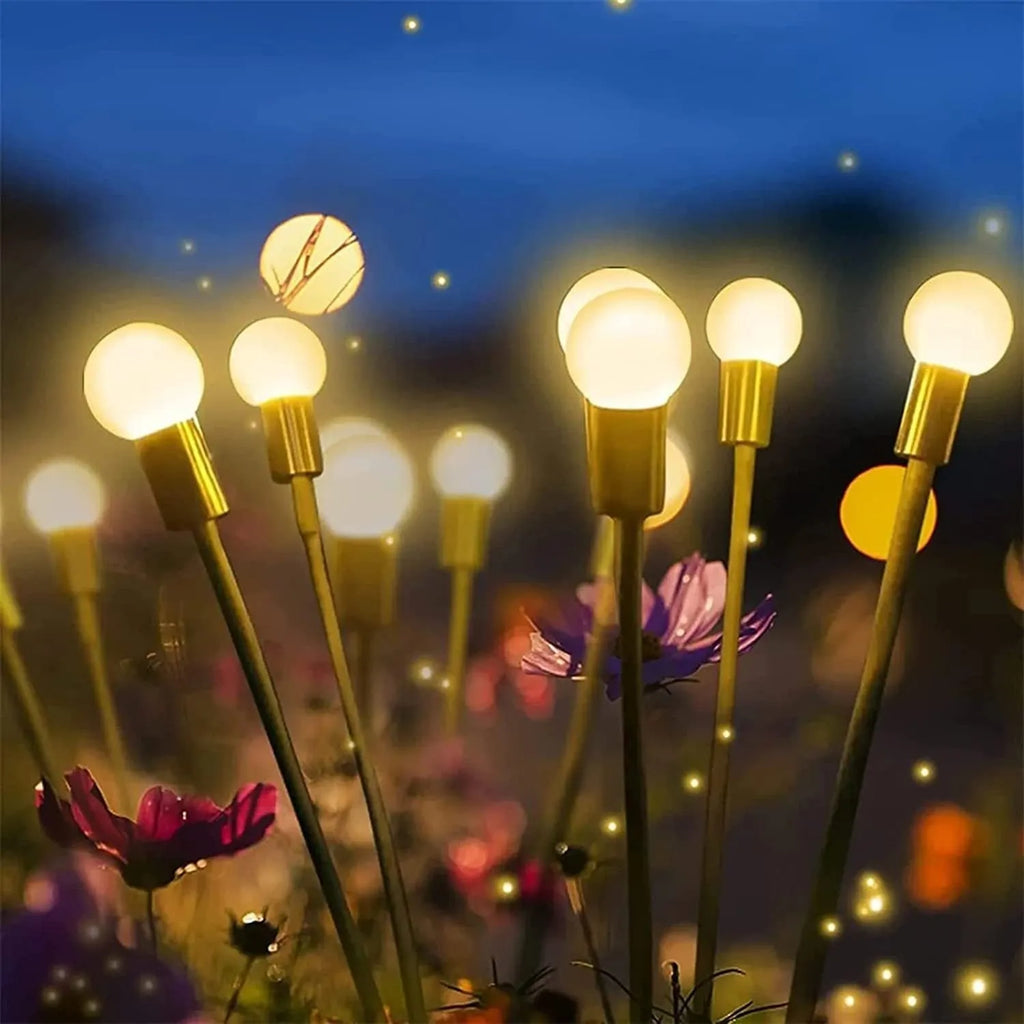 Solar-powered garden lamp with automatic light sensor and ground stake, showing warm white and coloured LED options.