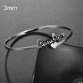 Personalised name bracelet in stainless steel with 10mm width, shown in silver, gold, or rose gold