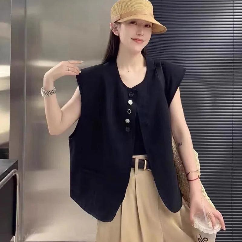 Women's loose fit polyester sleeveless vest in milky white with a visible pocket detail.