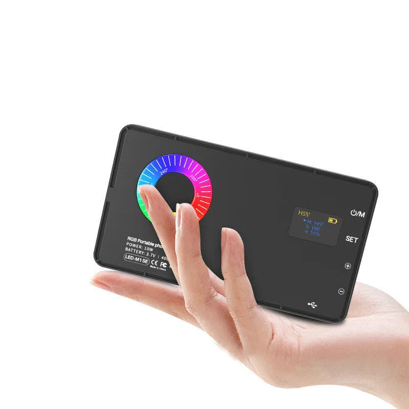 Portable LED RGB fill light in black, compact size 13.9cm, with adjustable brightness for indoor video