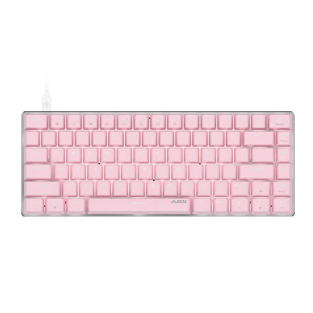 Compact white-backlit mechanical keyboard with 82 keys and metal body next to a laptop.