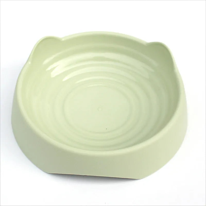 Ceramic slow feeder dog bowl with puzzle maze design in blue, green, or pink colour for fast-eating dogs