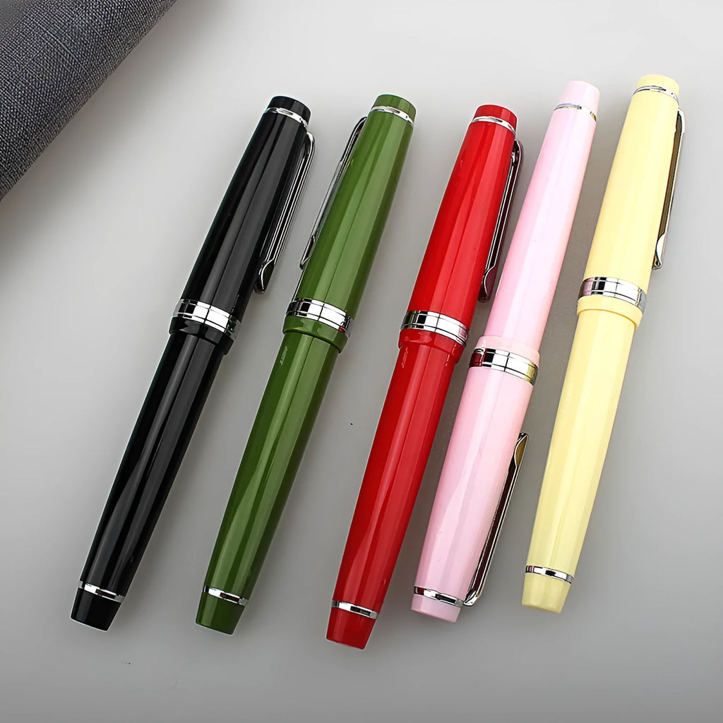 Short pocket ballpoint pen with resin body and stainless steel nib, shown in a selection of colours.