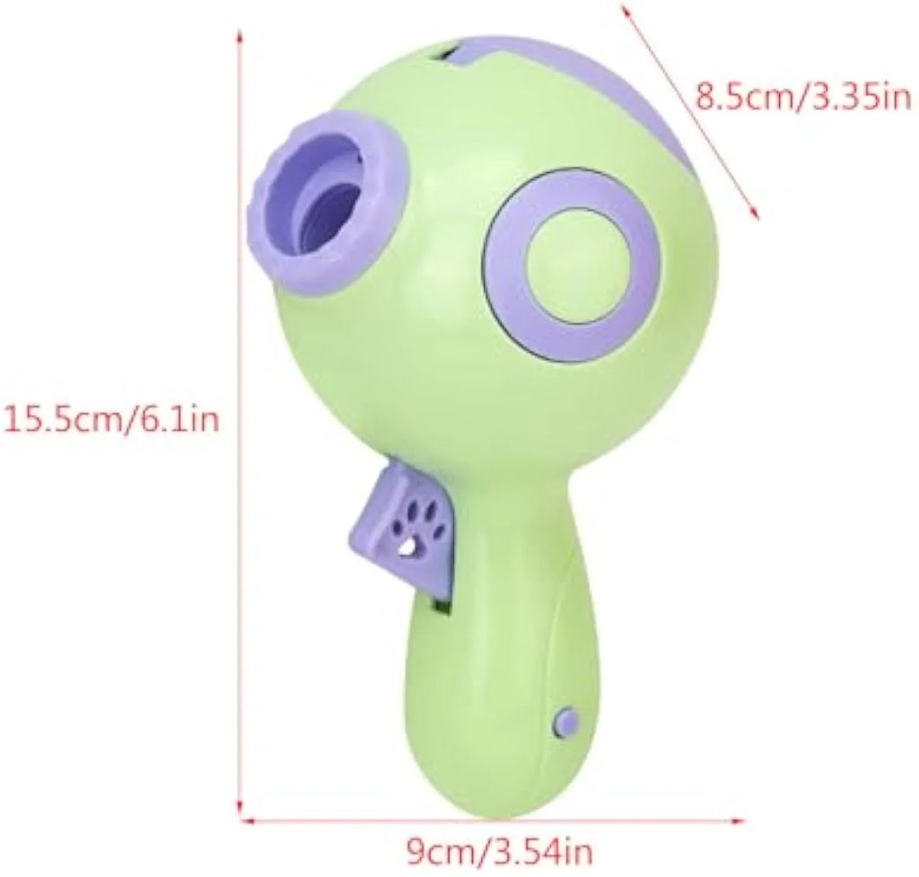 Green, orange, and pink plastic dog treat launcher toy with dispenser for interactive play and training.