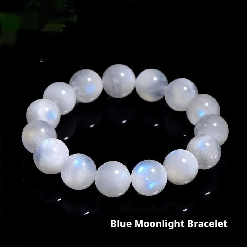 Natural blue moonstone round beads strung on a white cord bracelet.