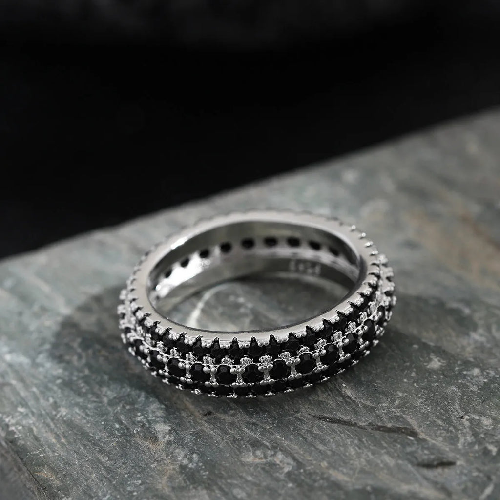Geometric triangle zircon inlay ring in copper with choice of plating finishes.