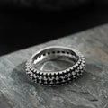 Geometric triangle zircon inlay ring in copper with choice of plating finishes.