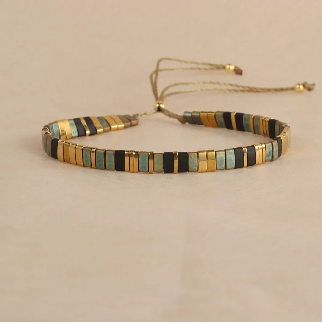 Geometric pull bead bracelet with round glass beads in five colour options