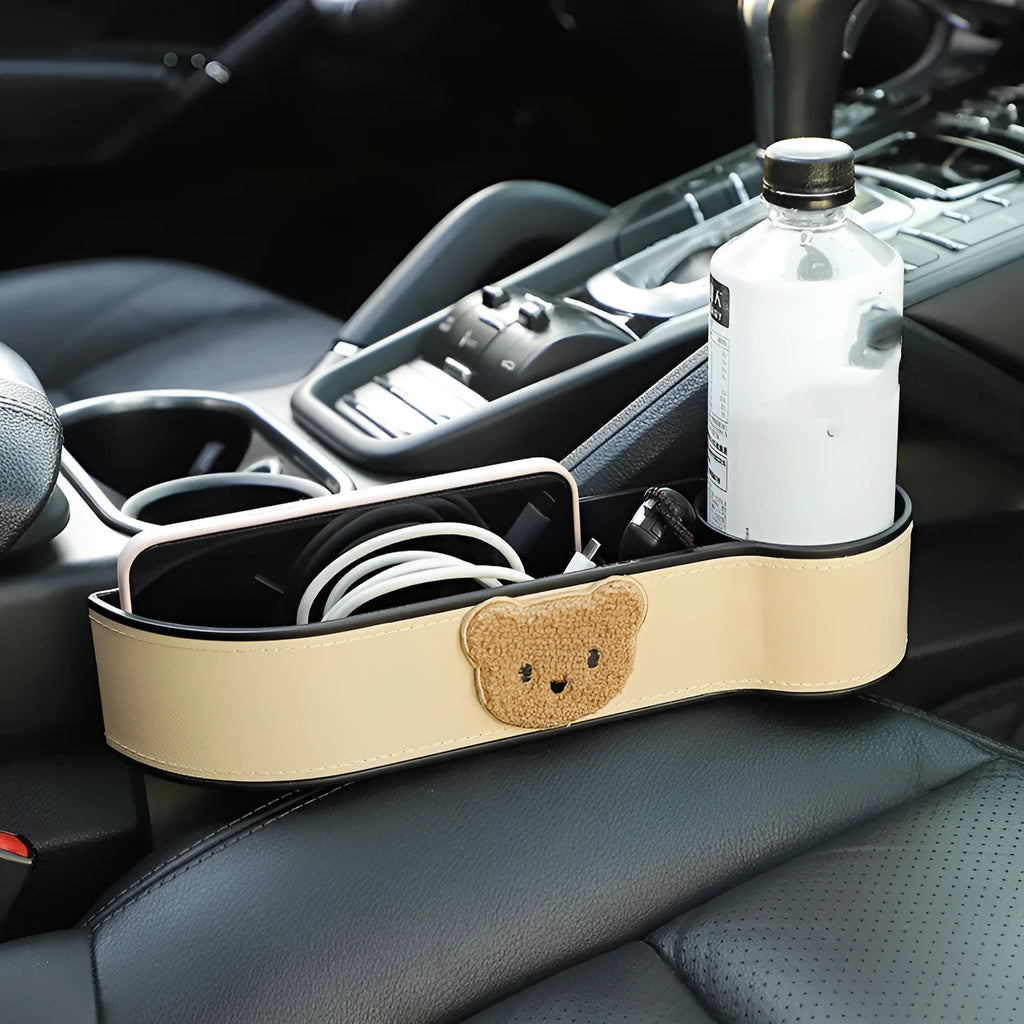 Car seat gap storage box with cartoon bear design made from leather
