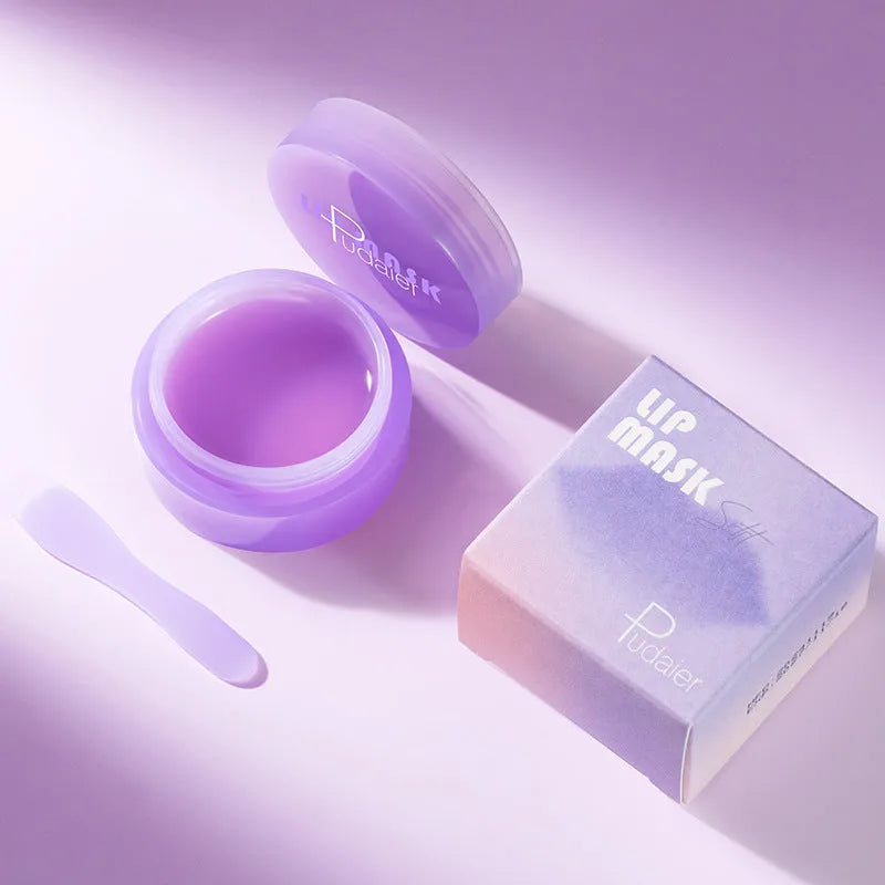 Box containing exfoliating lip balm, a lip film, and a scraper tool for lip care.