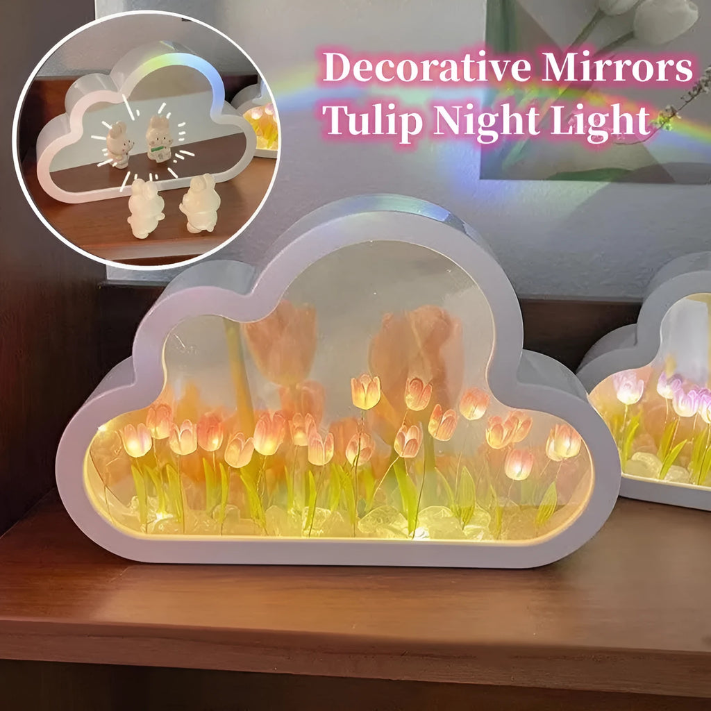 Assembled pink tulip-shaped night lamp with LED light, mirror front, and small photo frame on a desk.