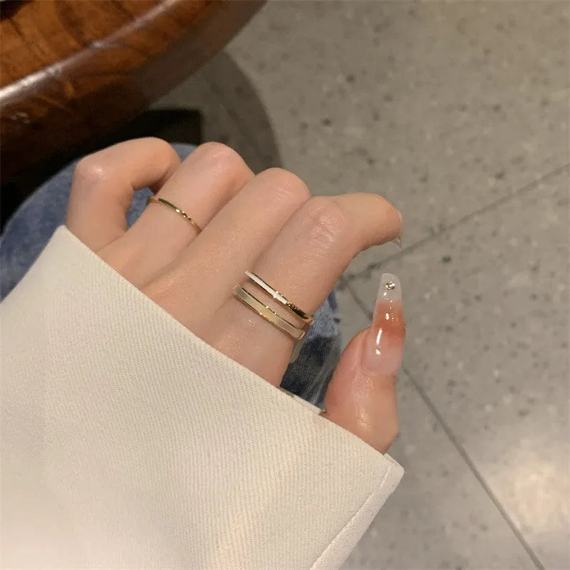 Women's Fritillaria Double Plain Ring in gold, copper geometric design with electroplated finish on white background