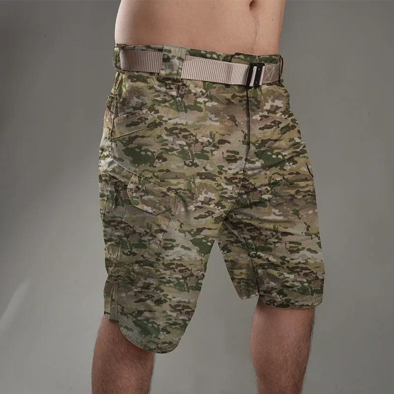 Khaki coloured tactical shorts made from cotton blend fabric on a mannequin.