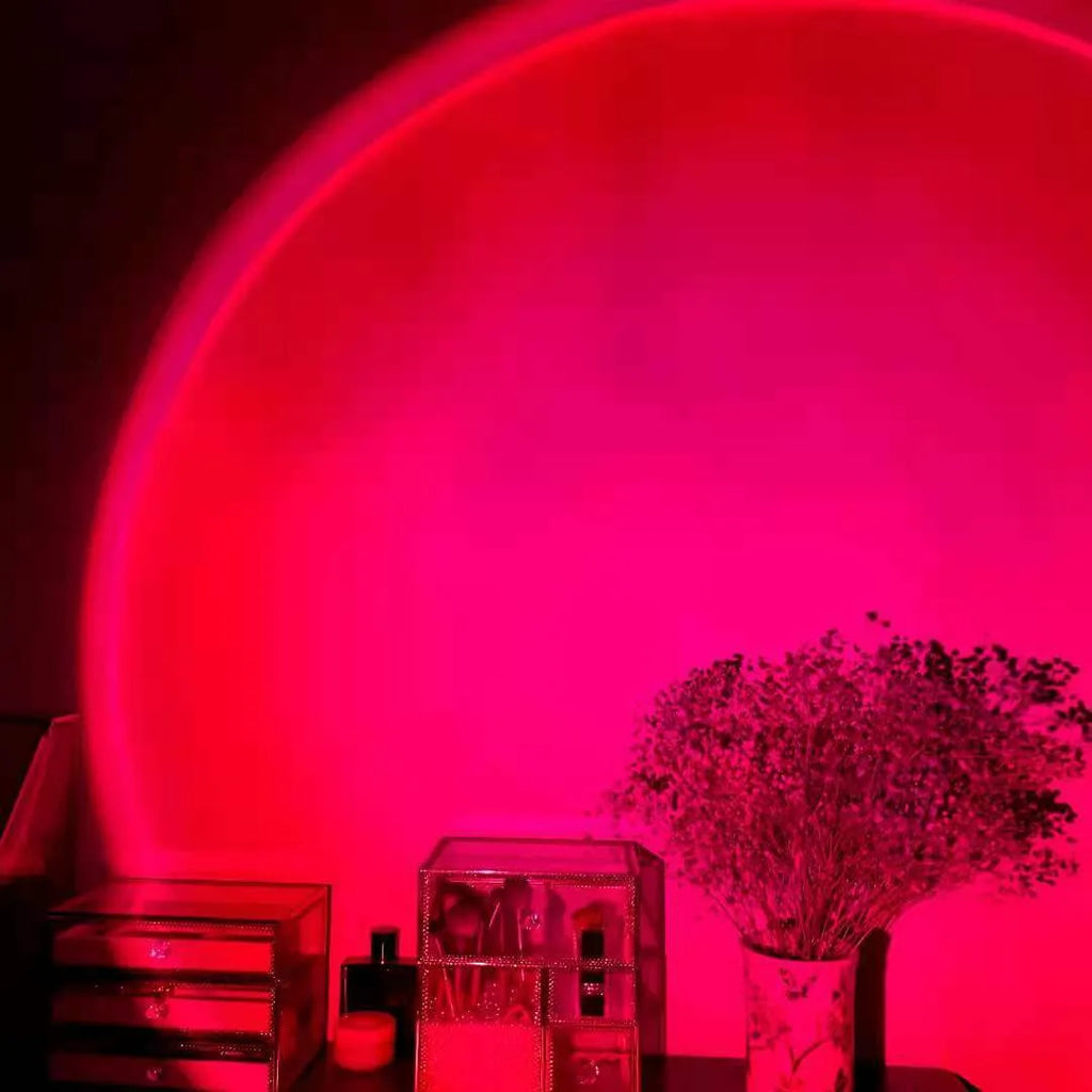 Rechargeable rainbow sunset projection lamp with USB connector showing sunset red colour projection