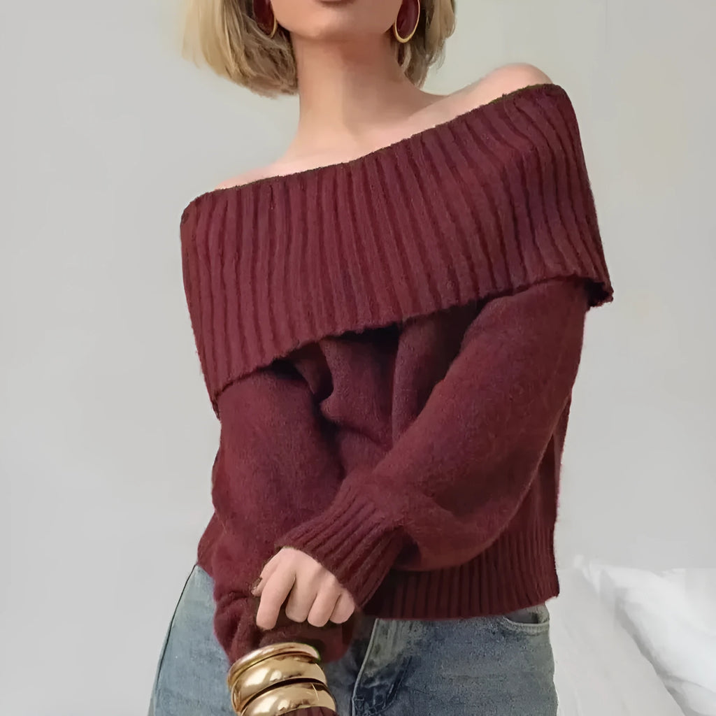 Grey off-the-shoulder sweater with a 3D textured pattern and regular sleeves on a model.