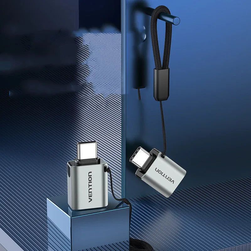 Grey aluminium alloy USB-C to USB-A OTG adapter with attached lanyard