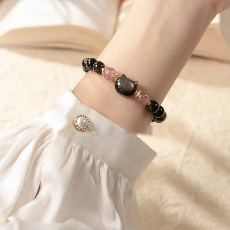 Black natural obsidian stone bead bracelet with silver kitty charm and sliding knot adjustment