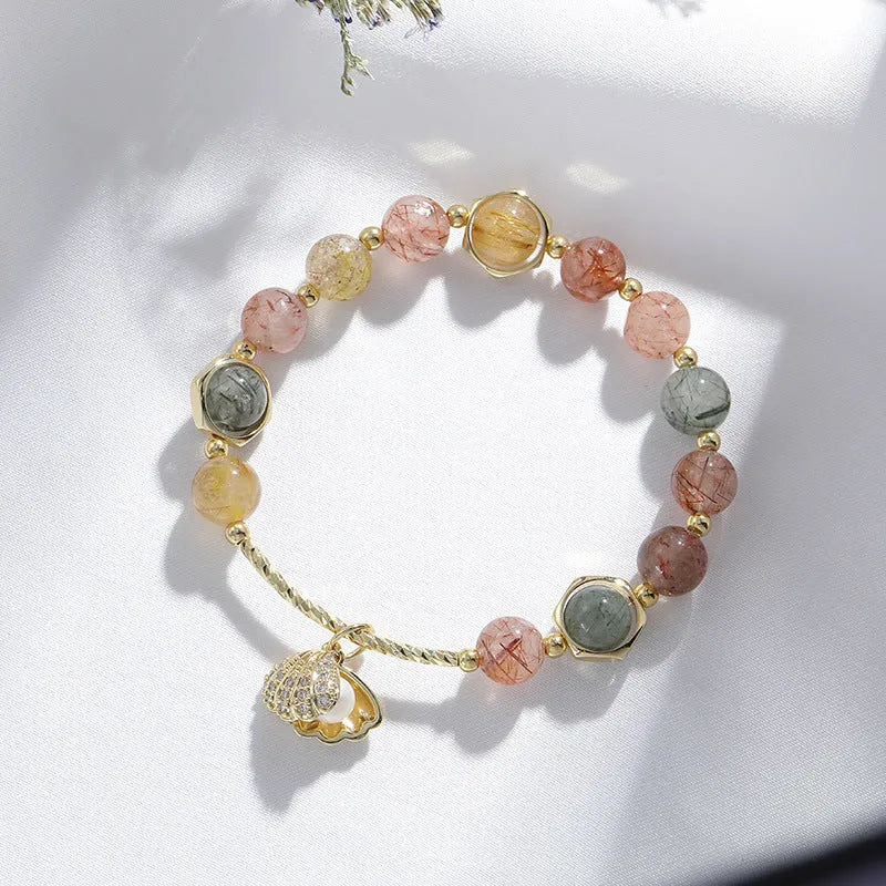 Women's crystal bracelet with coloured hair crystal and red sealant flower shell design