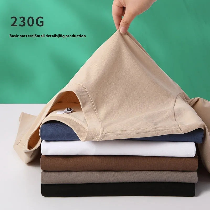 Man wearing a heavyweight apricot coloured drop shoulder loose fit t-shirt for casual wear.