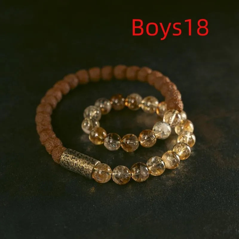 Retro style double circle bracelet with LCD display in citrine colour, showing girls and boys sizing options