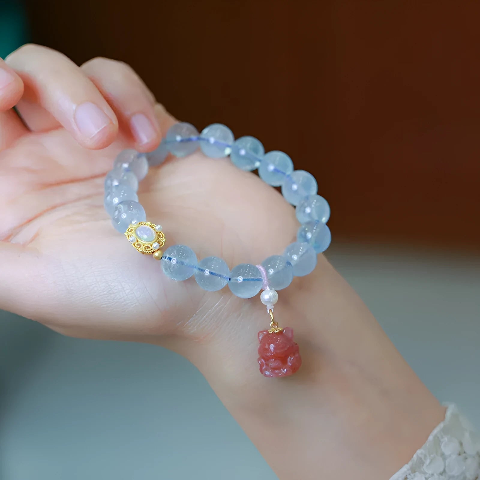 DIY aquamarine bracelet kit with Chinese fox motifs showing three colour variations for women