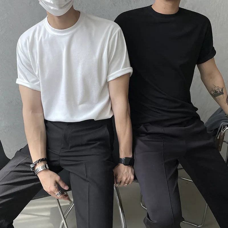 Men's black slim fit cotton T-shirt with round neck and half sleeves on white background